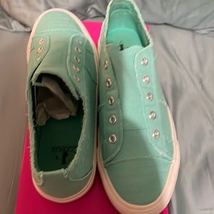 Corky’s brand new size 9 shoe.